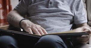 Book, reading and relax with a senior man in his retirement home to relax during free time with his favorite hobby. Study, sofa and books with a mature male pensioner enjoying a novel in his house - Powered by Shutterstock - Get 15% off with code: PIKWIZARD15