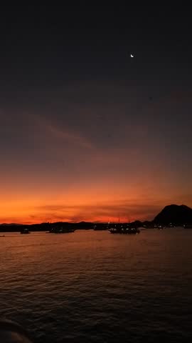The magician sunset from Flores sea Kalong Island, its means Taman Nasional Komodo. Labuan Bajo is a priority tourism destination. When sunset time comes, you can see a thousands of flying bats.