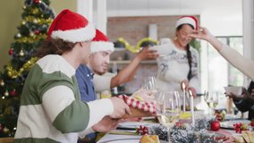 Group slicing salad and passing bread basket in kitchen, featuring social media marketing emojis. Festive, celebration, social, joyous, culinary, warm, cozy - Powered by Shutterstock - Get 15% off with code: PIKWIZARD15