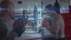 Coach holding mitts while boxer delivering red glove punches in gym ring, showing analytics overlay. Training, fitness, performance, technology, cardio, athleticism, biomechanics - Powered by Shutterstock - Get 15% off with code: PIKWIZARD15