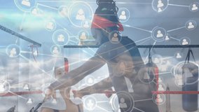 male trainer wrapping boxer's hands in fitness boxing gym, with digital network icons floating. Trainer, sports, fitness, technology, modern, strength, wellness - Powered by Shutterstock - Get 15% off with code: PIKWIZARD15