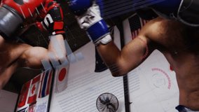 Mid adult male boxers sparring in boxing gym, showcasing fitness tech with chart-map overlays. Athleticism, combat, strength, rivalry, training, digital overlays, fitness - Powered by Shutterstock - Get 15% off with code: PIKWIZARD15