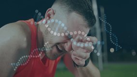 Male athlete wiping sweat on running track, featuring DNA helix animation and fitness smartwatch. Athlete, endurance, vitality, determination, technology, outdoor, nighttime - Powered by Shutterstock - Get 15% off with code: PIKWIZARD15