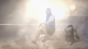 Senior hiker gripping trekking pole on rocky coast, showcasing travel data with floating route line. Adventure, exploration, landscape, durability, resilience, outdoor, natural - Powered by Shutterstock - Get 15% off with code: PIKWIZARD15