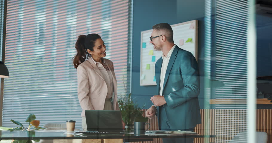 Handshake, deal and business people in office with investment negotiation, agreement or welcome. Greeting, merger and finance manager shaking hands with client for partnership, contract or thank you.