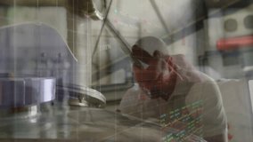 Barista operating espresso machine in cafe, showing overlaid finance graphs on tablet screen. Professional, technology, modern, finance, urban, innovation, business - Powered by Shutterstock - Get 15% off with code: PIKWIZARD15