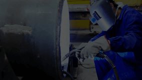 Welder using torch in industrial workshop, with animated green data overlay showing technology. Industrial, manufacturing, engineering, technology, safety, precision, machinery - Powered by Shutterstock - Get 15% off with code: PIKWIZARD15