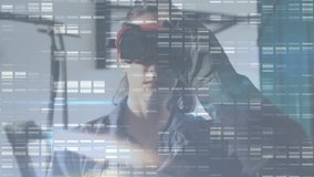 Technician adjusting VR headset while overlaying data charts over bicycle frame in tech workshop. Industrial, innovation, futuristic, engineering, digital, technology, workspace - Powered by Shutterstock - Get 15% off with code: PIKWIZARD15