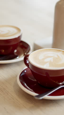 Service, latte art and above in cafe, hospitality and industry with cafeteria, spoon and french roast. Empty, restaurant or coffee shop with creativity, beverage and espresso with caffeine or pattern