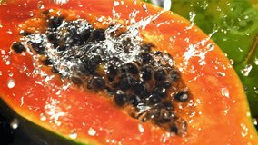 Fresh tropical papaya with drops and splashes of water. Filmed on a high-speed camera at 1000 fps. High quality FullHD footage - Powered by Shutterstock - Get 15% off with code: PIKWIZARD15