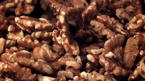 Walnuts fall into a wooden bowl. Filmed on a high-speed camera at 1000 fps. High quality FullHD footage - Powered by Shutterstock - Get 15% off with code: PIKWIZARD15