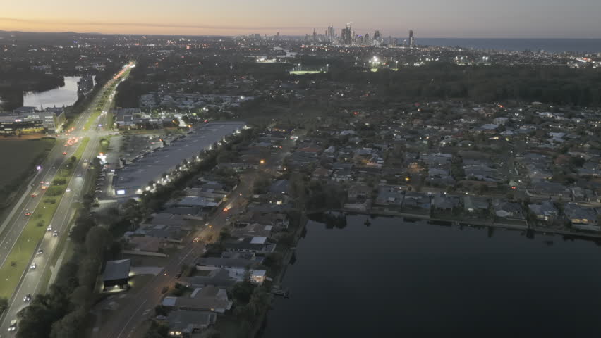 Aerial Highway Timelapse Of Surfers Paradise Gold Coast Night.Busy Motorway Car Traffic.Iconic Skyline View Of Broadbeach Skyscrapers Architecture Qld Australia