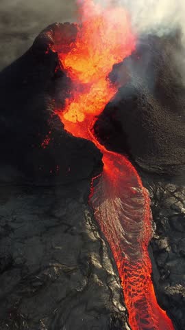 Vertical Screen: Volcano Eruption, Flowing Red Hot Lava Erupts from Crater, Incredible Natural Phenomena, Spectacular Dramatic Scenery in Iceland, Shot for Social Media