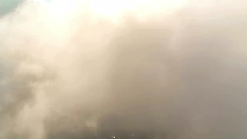 Atmospheric Haze, Smoky Air, Diffused Light, Outdoor Scene, Natural Phenomenon