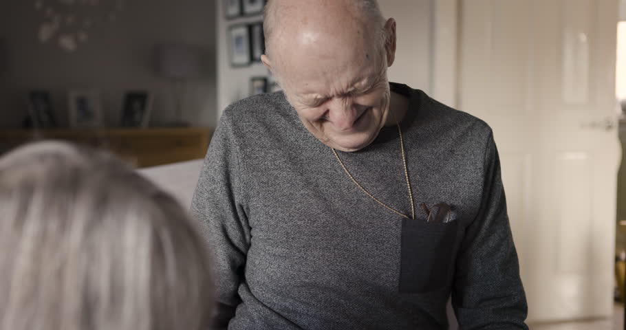 Help, senior rehab and elderly man getting helped by caring wife in his retirement home. Mature couple in nursing home with help for struggling, frail old man. Relationship, retire people with care