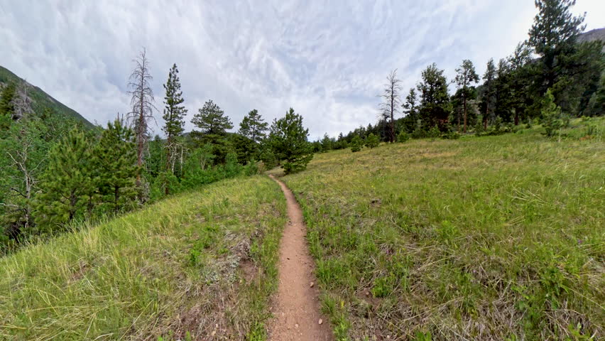Hiking Over Narrow Single Track to Bridalveil Falls In Rocky Mountain National Park