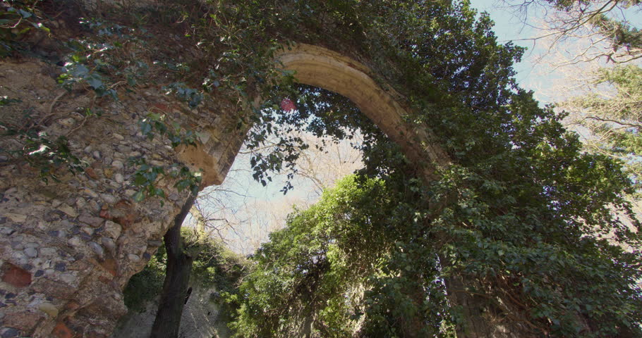 mid shot looking up at the east window of the derelict Saint Mary