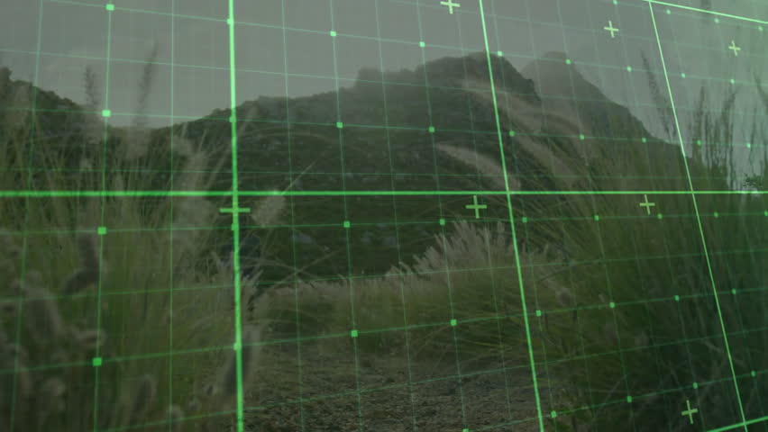Two hikers exploring mountain trail among grasses, demonstrating technology via green digital grid. Adventure, exploration, wilderness, innovation, outdoor, sea green, dynamic