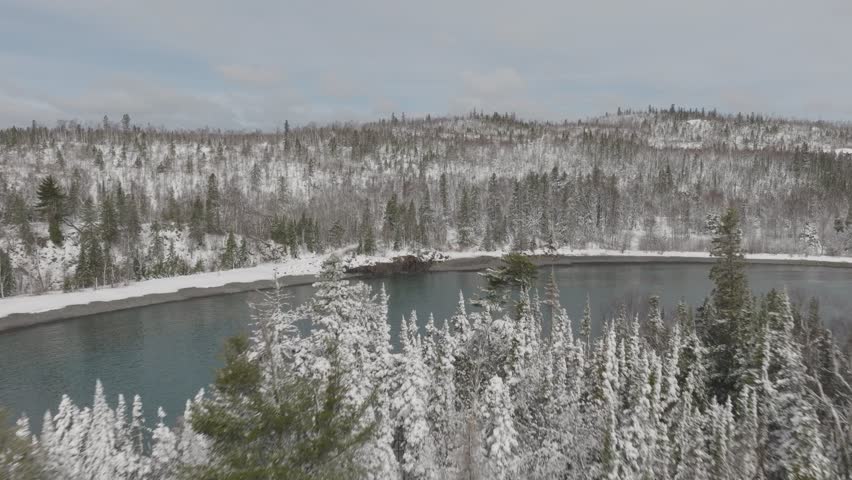 Split Rock Lighthouse State Park Snow-covered Forest On The North Shore Of Lake Superior In Minnesota, USA. - aerial shot