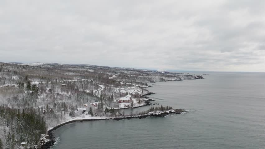 Aerial View Of Cove Point Lodge Facing Lake Superior During Winter In Minnesota, USA.