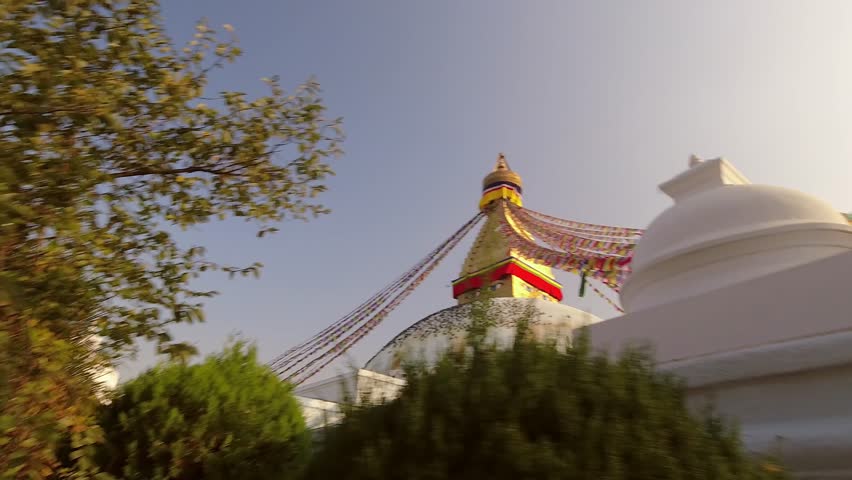 Kathmandu, Nepal - 15th november, 2023: hyper lapse circular view Bouddha or Boudhanath on sunset view. First stupa in Kathmandu, Nepal. Popular travel destination landmark