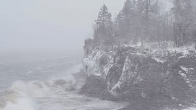 Waves Crashing On Snowy Cliff With Dense Fog And Blizzard On Rugged Shore Of Lake Superior In Minnesota. static shot - Powered by Shutterstock - Get 15% off with code: PIKWIZARD15