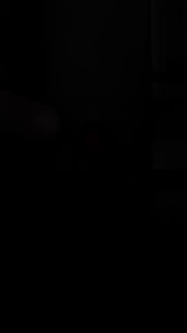 An Illuminated Device featuring Microsoft Branding set against a Dark Environment backdrop