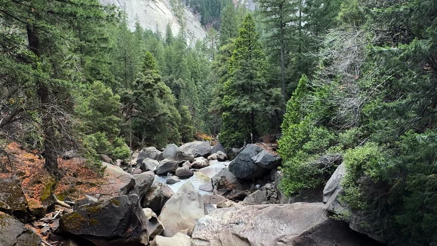 view of Yosemite Valley from Lower Yosemite Falls during sunrise TILT UP