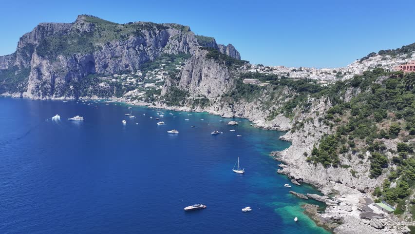 Capri Island At Naples In Campania Italy. Beach Landscape. Tourism Landmark. Capri Island At Naples In Campania Italy. Gulf Of Naples Skyline. Coastal Cityscape. Mediterranean Sea.