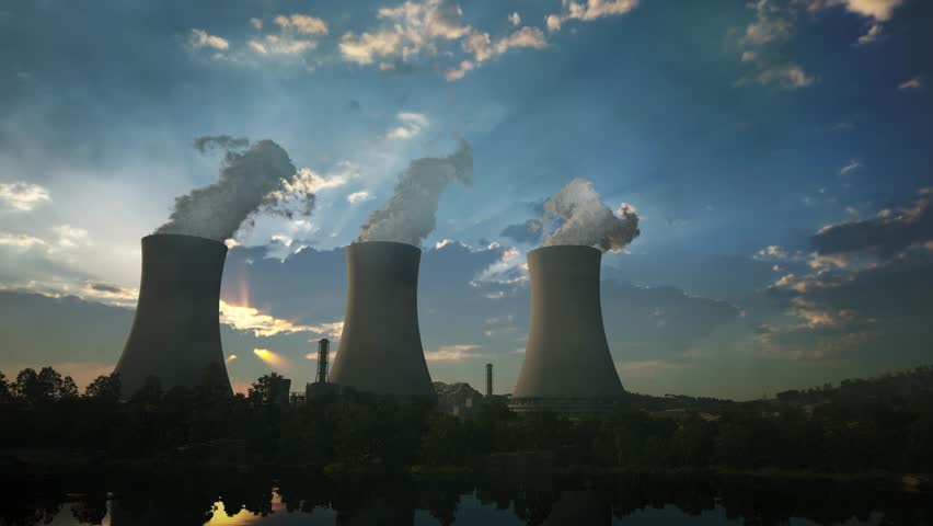 Steaming Cooling Towers Of Nuclear Power Plant