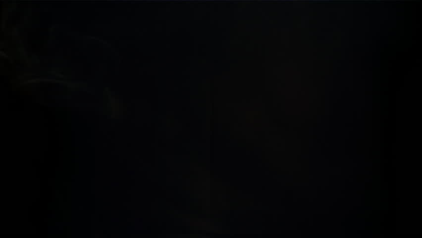 Smoke on a black background. Filmed on a high-speed camera at 1000 fps. High quality FullHD footage