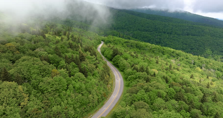 Forest road in North Carolina Appalachian mountains, USA. Blue Ridge Parkway American highway in summer rain season
