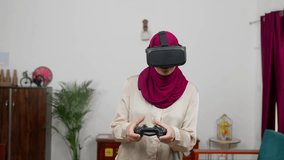 Muslim Woman in Hijab Scarf Playing Game with Controller in VR, Virtual Reality - Powered by Shutterstock - Get 15% off with code: PIKWIZARD15