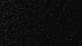 animated abstract movement of multicolored particles on dark background like a starry sky - Powered by Shutterstock - Get 15% off with code: PIKWIZARD15