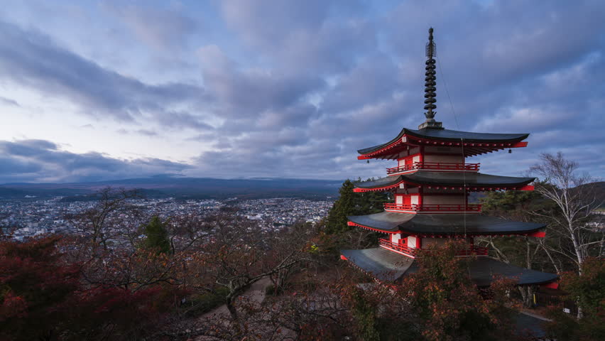 Timelapse of sunrise over Mount Fuji with the historic Chureito Pagoda in the autumn season, Fujiyoshida, Japan.