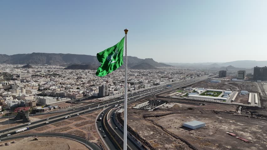 Saudi Arabia flag waving in the sky - Saudi national day and Founding Day