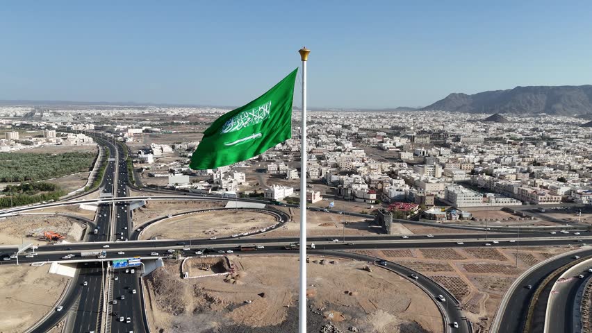 Saudi Arabia flag waving in the sky - Saudi national day and Founding Day