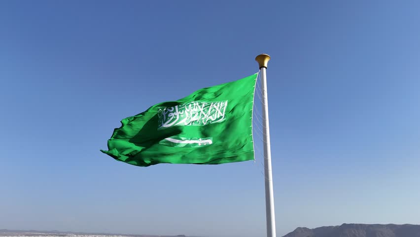 Saudi Arabia flag waving in the sky - Saudi national day and Founding Day
