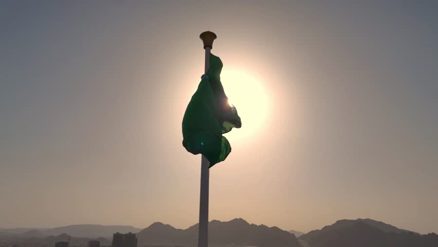 Saudi Arabia flag waving in the sky - Saudi national day and Founding Day