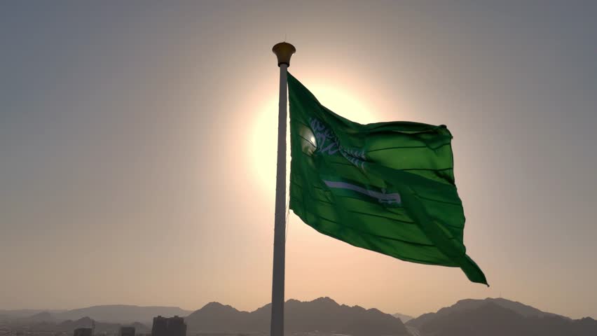 Saudi Arabia flag waving in the sky - Saudi national day and Founding Day