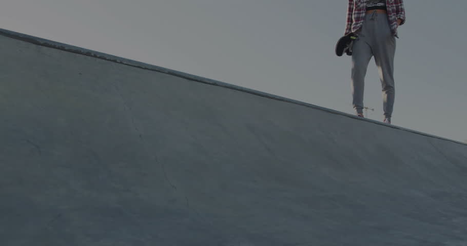 woman skater standing on half-pipe, showcasing technology with animated pink-purple light streaks. Urban, action, dynamic, youthful, energetic, vibrant, streetwear