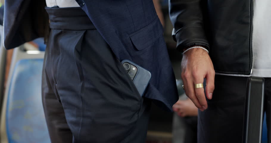 People, hands and thief with phone on bus for pickpocket, theft or stealing in public transportation. Closeup, crime or robber with mobile smartphone or fraud in vehicle for sneak, secret or snatch