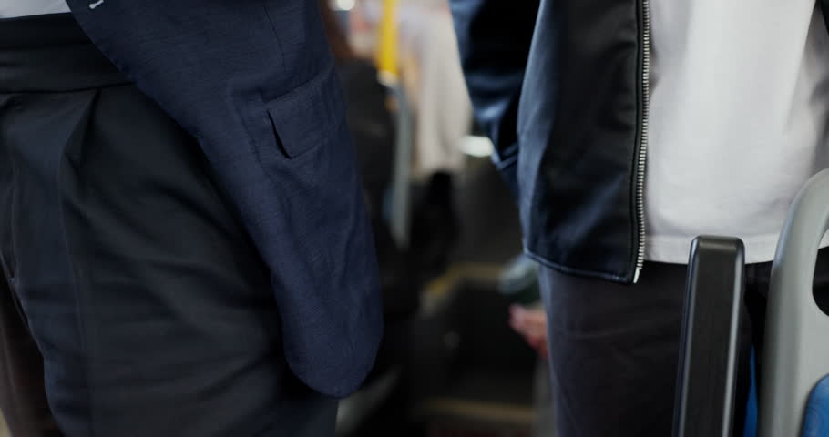 People, hands and thief with phone on bus for pickpocket, theft or stealing in public transportation. Closeup, crime or robber with mobile smartphone or fraud in vehicle for sneak, secret or snatch