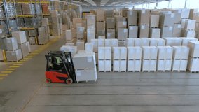 A forklift driver navigates the vast warehouse, highlighting the efficient organization and movement of goods in a storage facility. - Powered by Shutterstock - Get 15% off with code: PIKWIZARD15