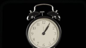 Time to Make a Great Money. The hands of the clock rotate rapidly on the dial. Exactly at 12 o'clock the alarm clock starts ringing. Behind him, against a black background, banknotes begin to slowly f - Powered by Shutterstock - Get 15% off with code: PIKWIZARD15