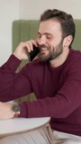 Cafe, man and happy with phone call for talking, negotiation and communication with digital contact. Coffee shop, male person and customer with mobile for conversation, listening and smile for chat - Powered by Shutterstock - Get 15% off with code: PIKWIZARD15