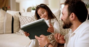 Home, game and dad with child for tablet, support and education app for cognitive development. Couch, laugh and father with girl for digital streaming, learning website and bonding together in house - Powered by Shutterstock - Get 15% off with code: PIKWIZARD15