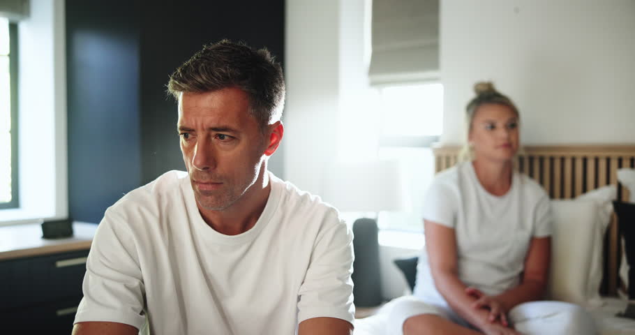 Bedroom, couple and man with ignore after fight, misunderstanding and sad in toxic marriage. Home, woman and angry partner with silent treatment in relationship, cheating and divorce for infidelity