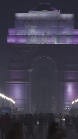 New Delhi, India. People walking near India Gate Or All India War Memorial In Evening Night Time. Statue Of Subhas Chandra Bose Or Netajis Statue On Background. National Hero.