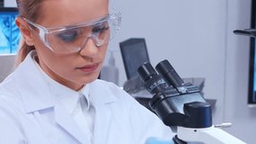 Scientific laboratory filled with various research equipment. Scientists are conducting experiments and research. Science and technology concept. - Powered by Shutterstock - Get 15% off with code: PIKWIZARD15